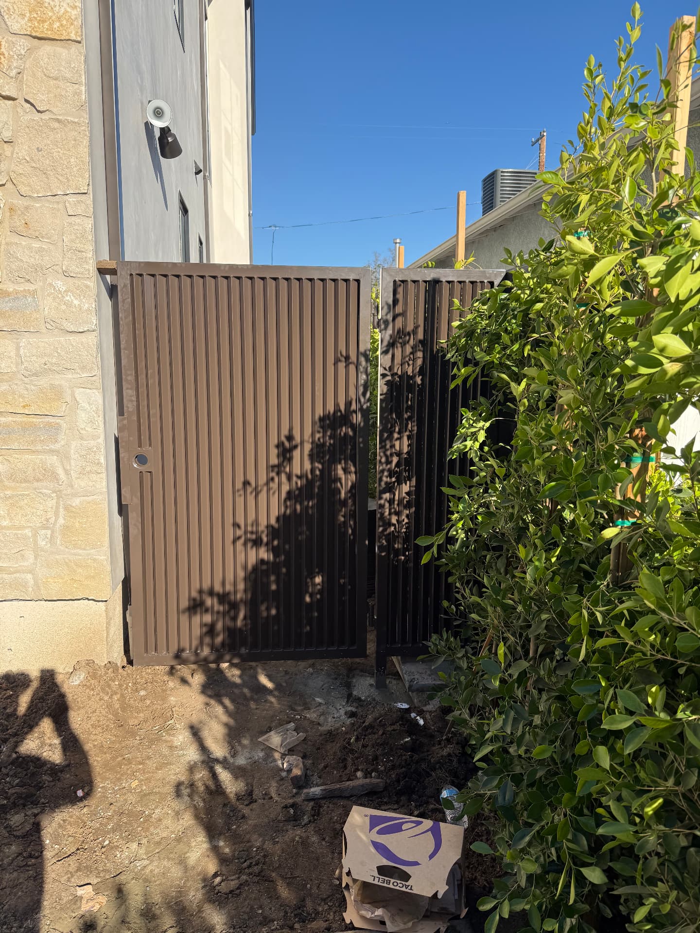 Bronze Slat Side Gate — Exterior