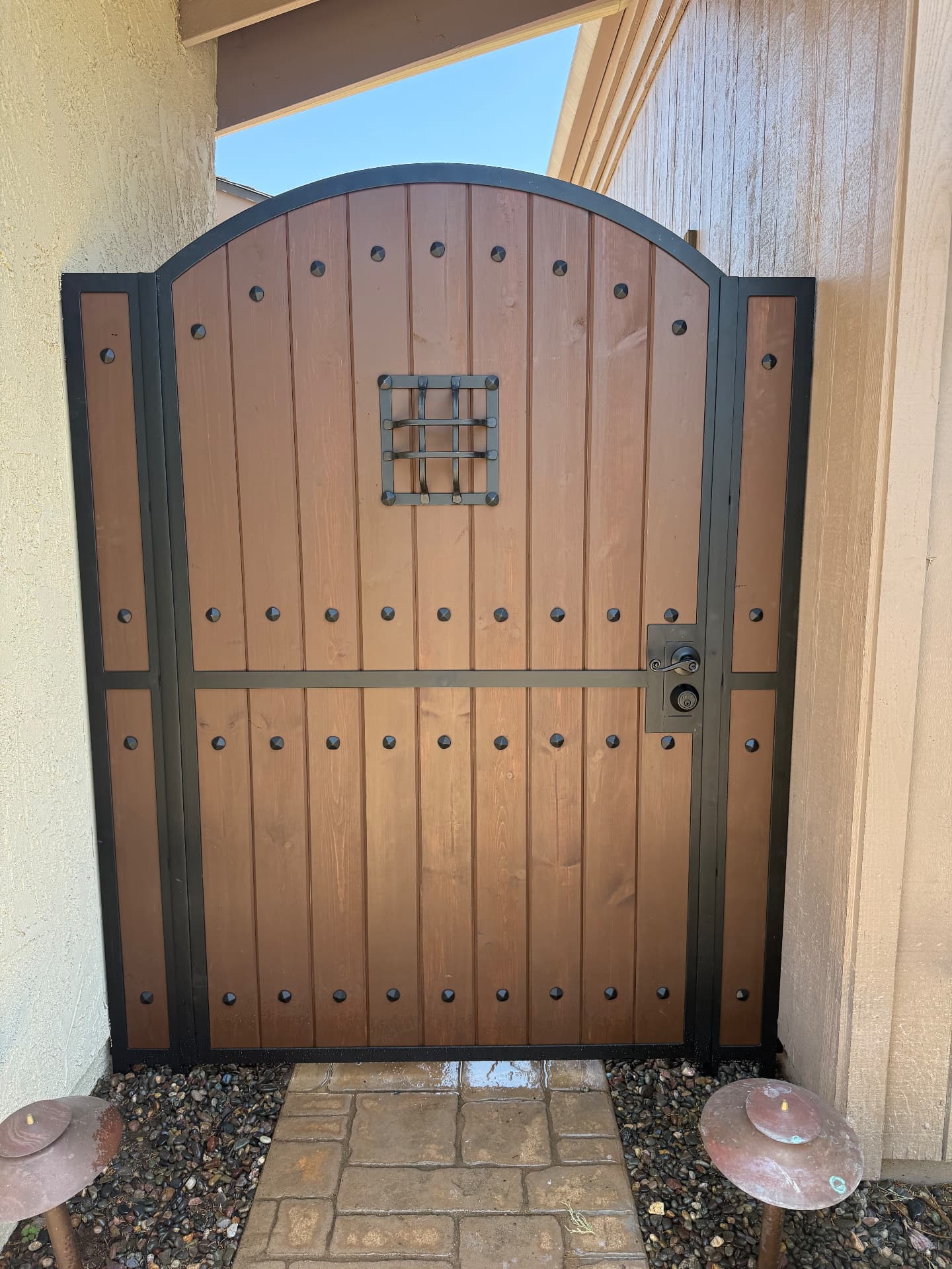Arched Wood Gate with Iron Grille