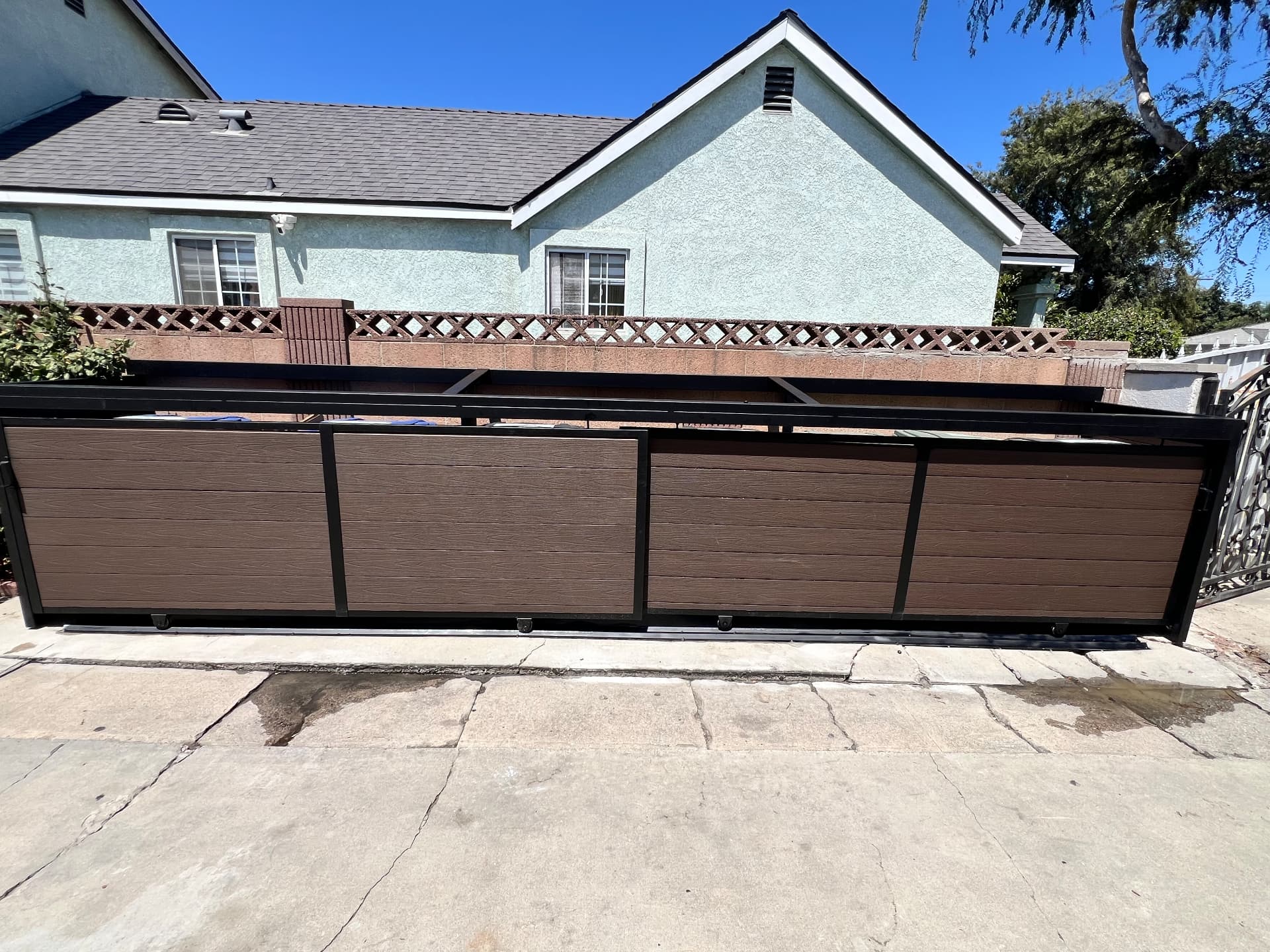 Composite Panel Rolling Gate